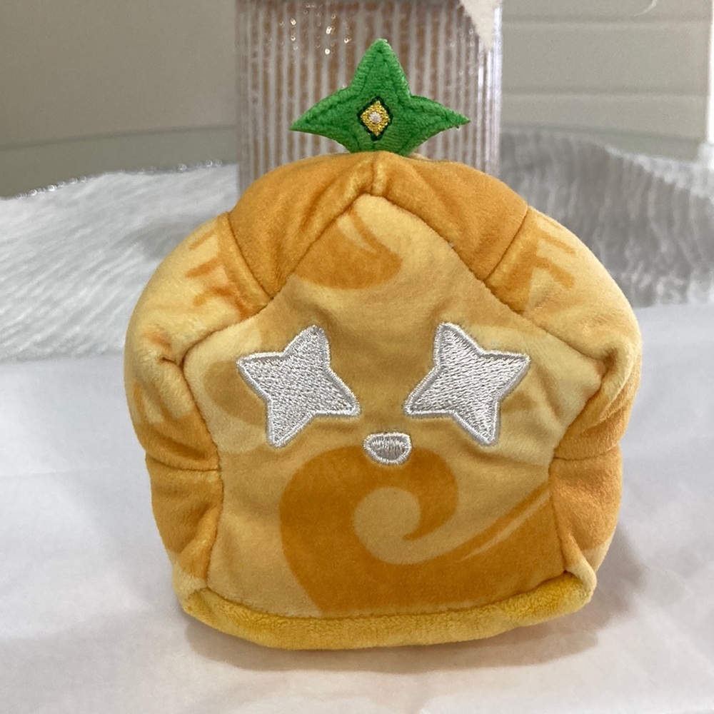 Yellow and Orange Plush Pumpkin Hat with Star Eyes